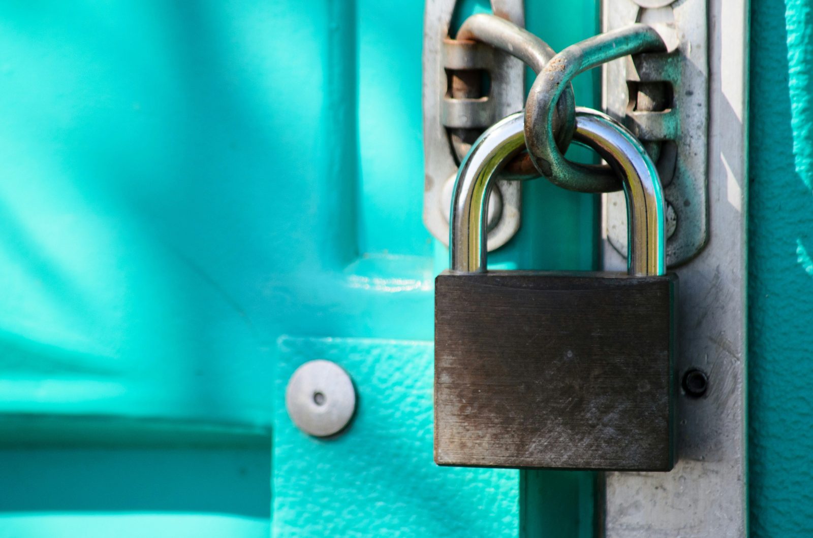 A padlock securing a door, symbolizing how AKONCEPT protects the data you share